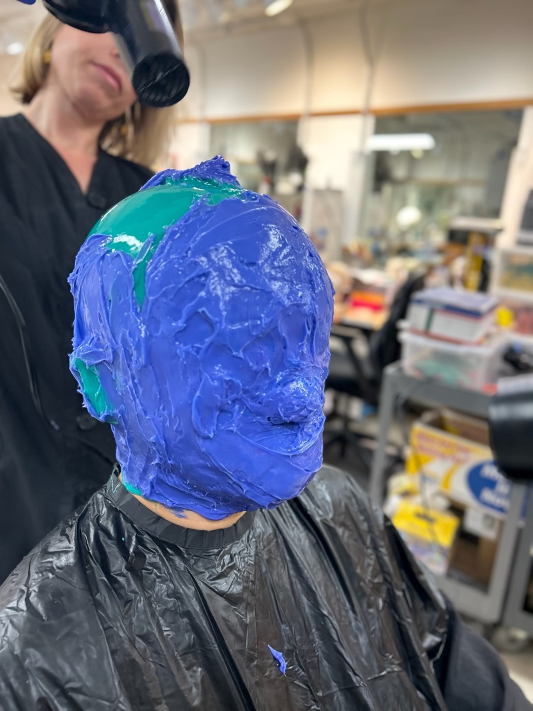 Zhengyi Bai during the process of making the plaster mold of his head.