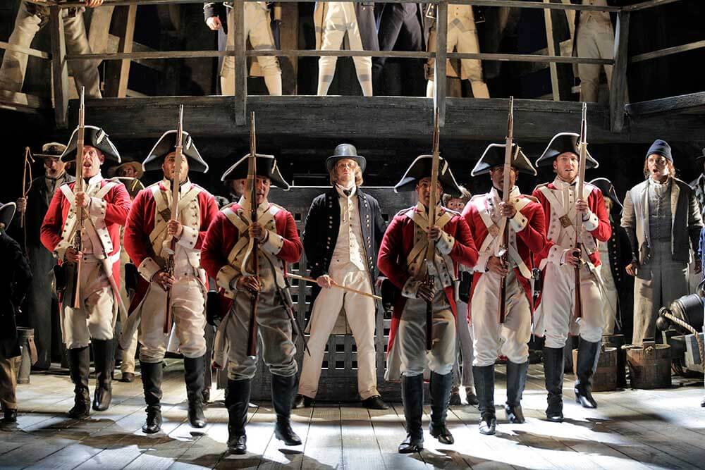 Officers, soldiers and sailors contrast in Christopher’s stunning costume design.