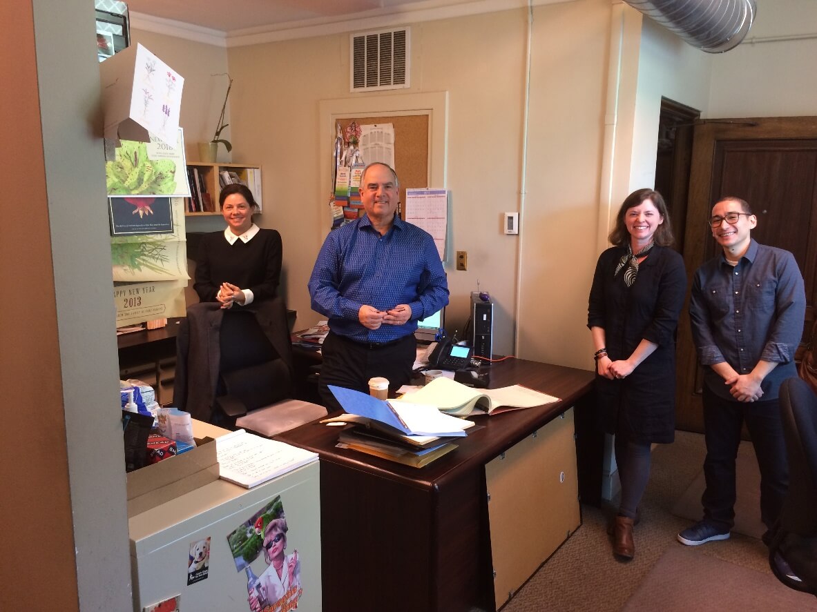 Members of the downstairs Box Office team. From left to right: Jessica Fauver, Mark Sackett, Rebecca Page and Roberto Bonilla (not pictured: Jennifer Hughes). The wall to the left is the wall you see just behind the Box Office windows.