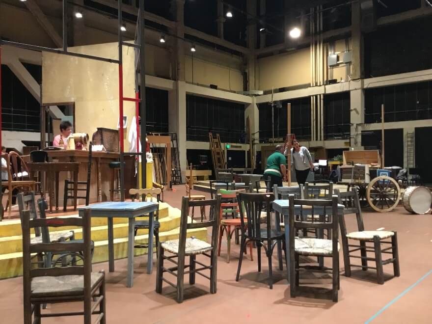 The frame of Mamma Lucia’s bar in the Caminito in staging rehearsals in Zellerbach Rehearsal Hall, as Jill Grove, Dimitri Platanias and Lianna Haroutounian rehearse.