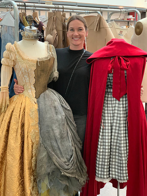 Costume Production Supervisor Galen Till with the Cinderella and Red Riding Hood costumes.
